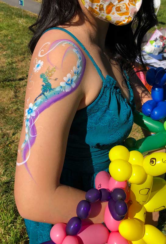 glitter tattoo and fairy arm paint by Auntie Stacey's face painting and balloon twisting, Santa Rosa, CA